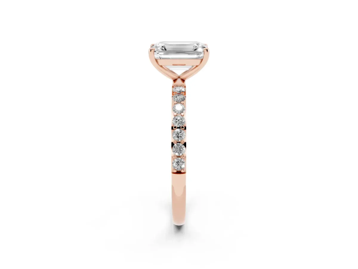Emerald Cut Diamond Solitaire Ring with Round Pavé Shoulders and Prong Setting Rose gold