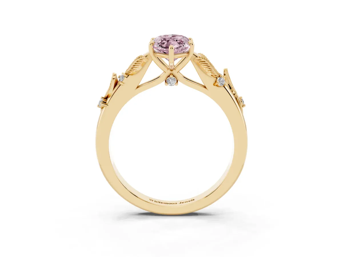Fancy Pink Marquise Cut Diamond Solitaire Ring with Leaf Motif Band and Four-Prong Setting Yellow gold