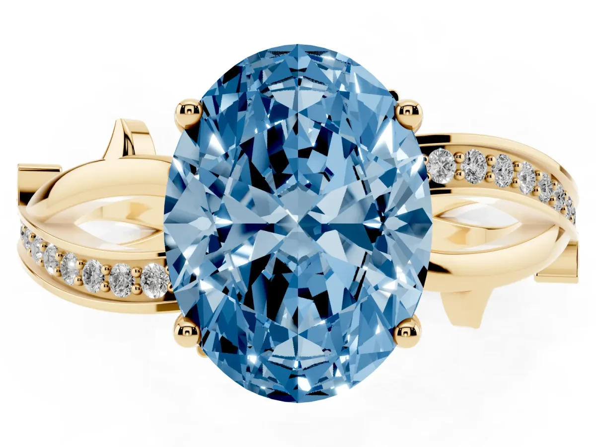Fancy Blue Oval Cut Solitaire Twist Band with Pavé Accents and Four-Prong Setting Yellow gold