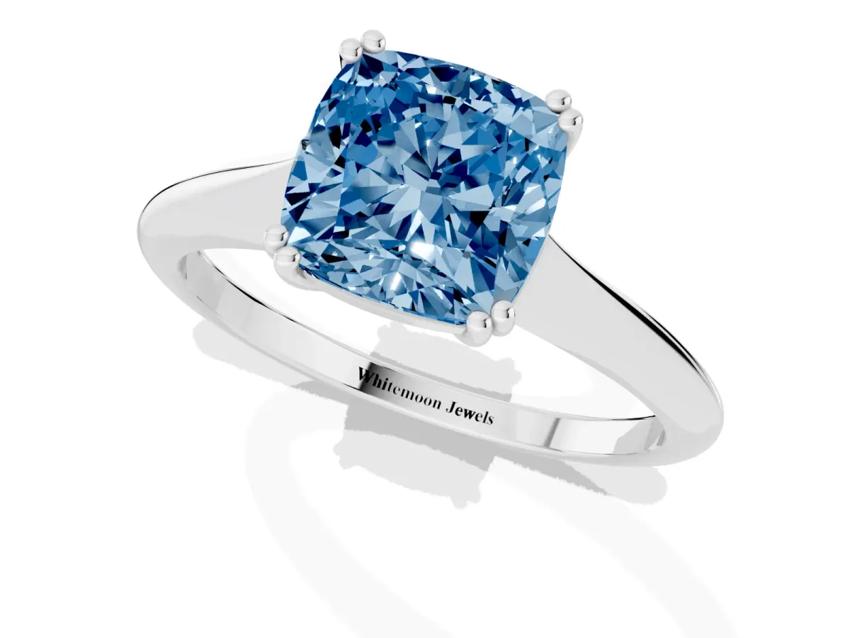 Fancy Blue Cushion Cut Solitaire Diamond Ring with Six-Prong Setting and Classic Band Silver