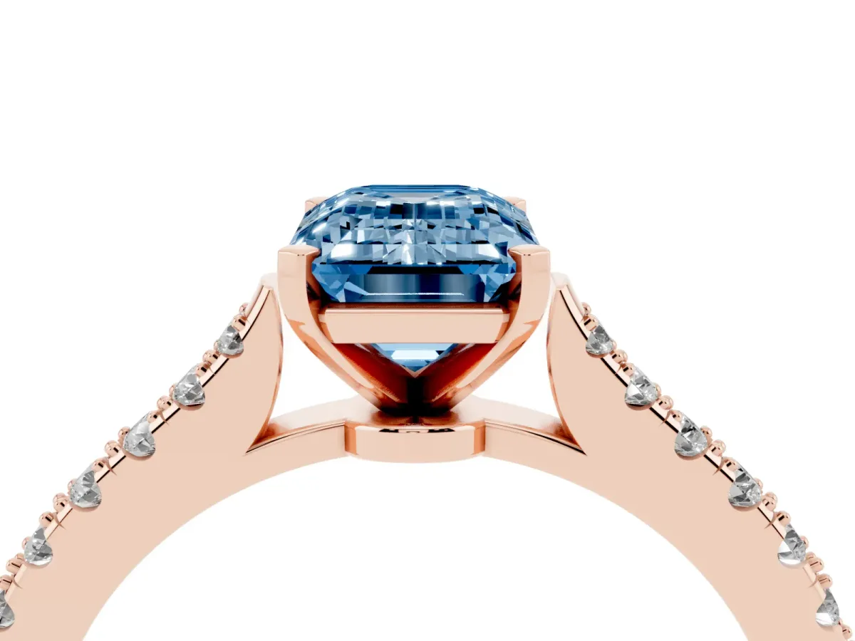 Fancy Blue Emerald Cut Cut Solitaire Diamond Engagement Ring with Pave Band and Four-Prong Setting Rose gold