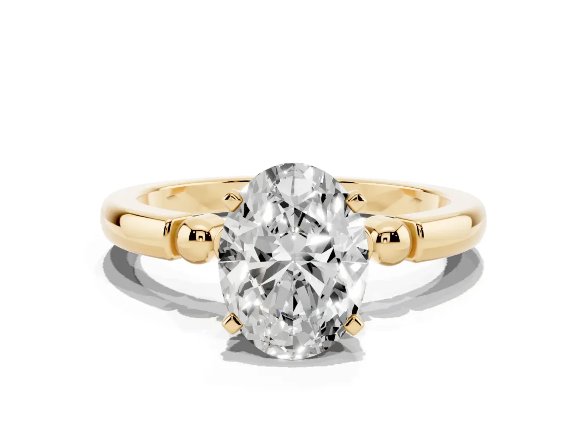 Oval Cut Solitaire Beaded Band with Four-Prong Setting Yellow gold