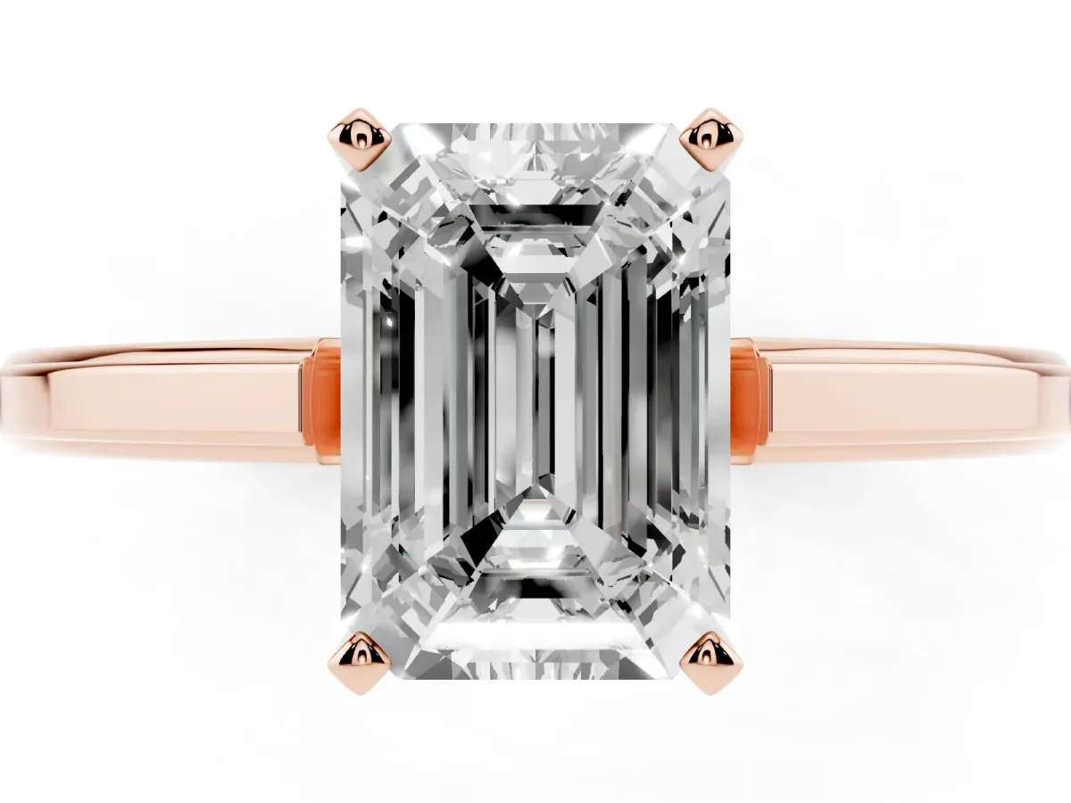 Emerald Cut Solitaire Diamond Ring with Four-Prong Setting and Classic Band Rose gold