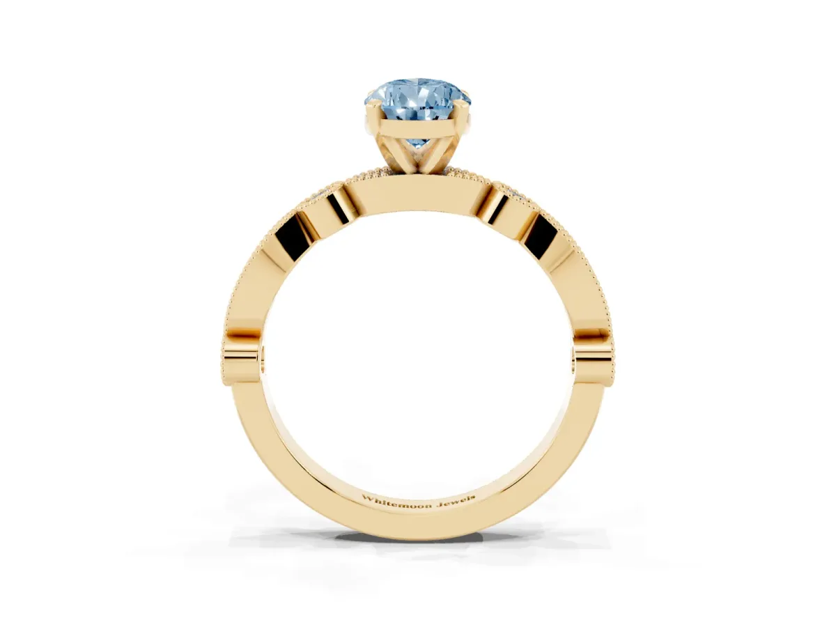 Fancy Blue Pear Cut Milgrain Bezel Diamond Engagement Ring with Solitaire Prong Setting Yellow gold