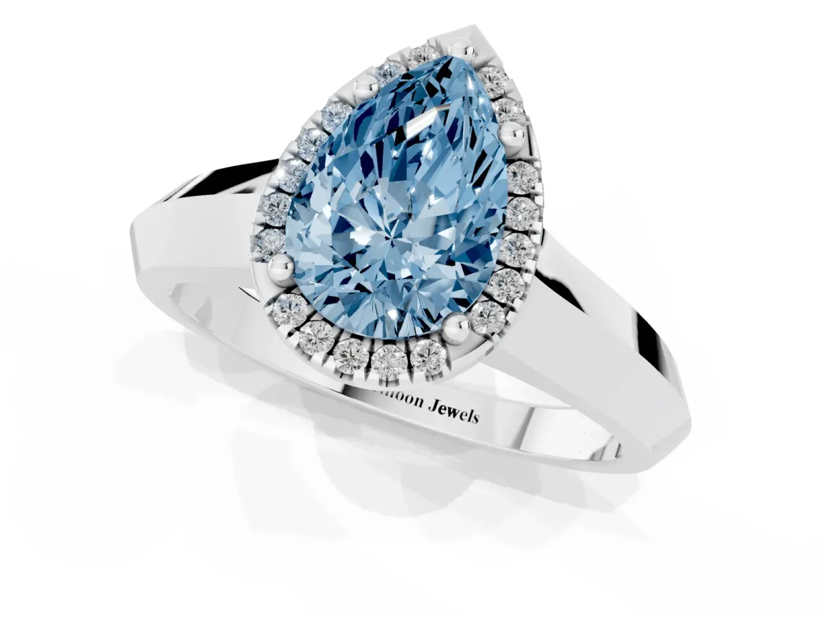 Fancy Blue Pear Cut Halo Diamond Ring with Cathedral Band and Four-Prong Setting White gold