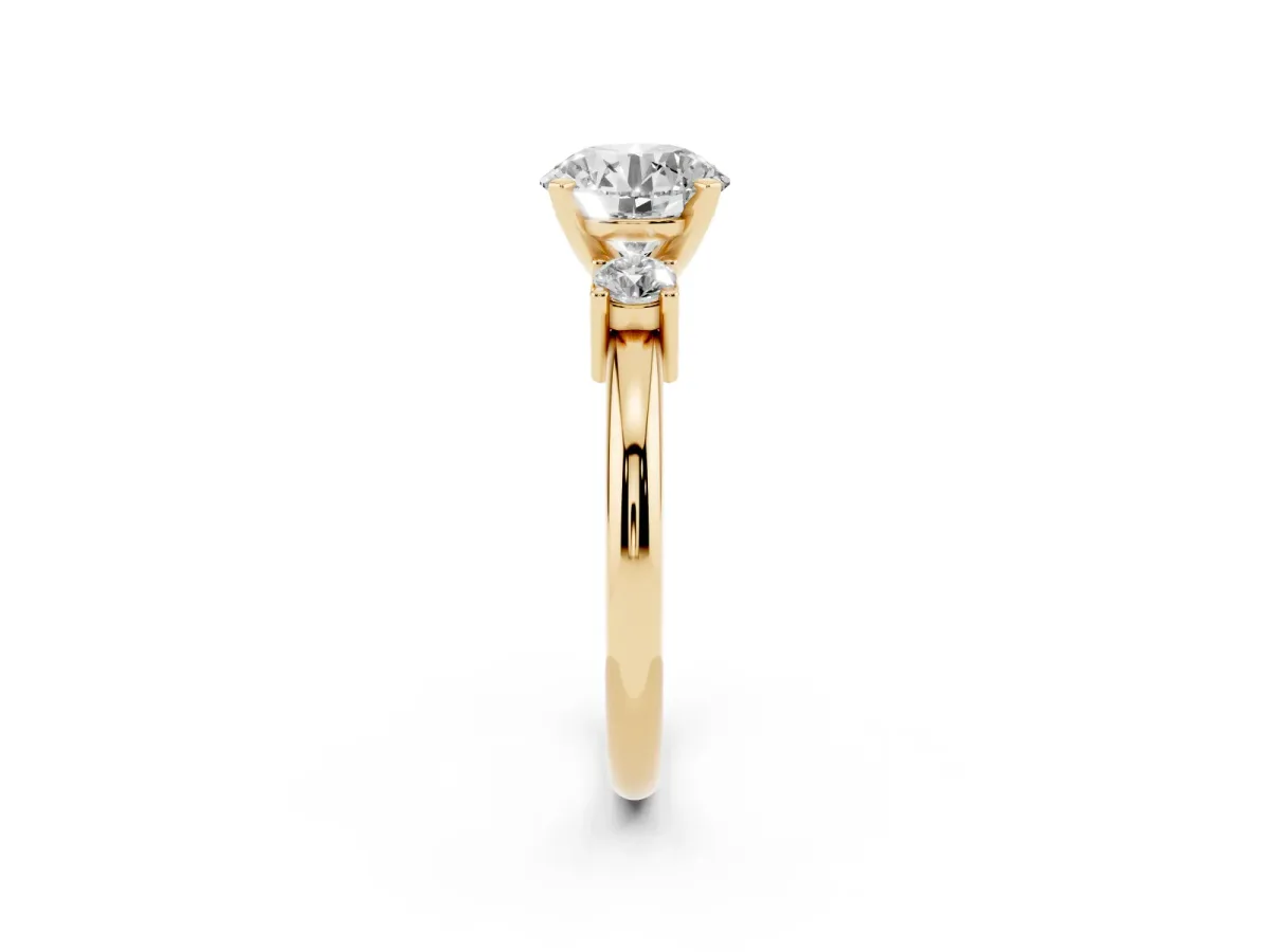 Three-Stone Round Cut Cut Diamond Solitaire with Prong Setting and Classic Band Yellow gold