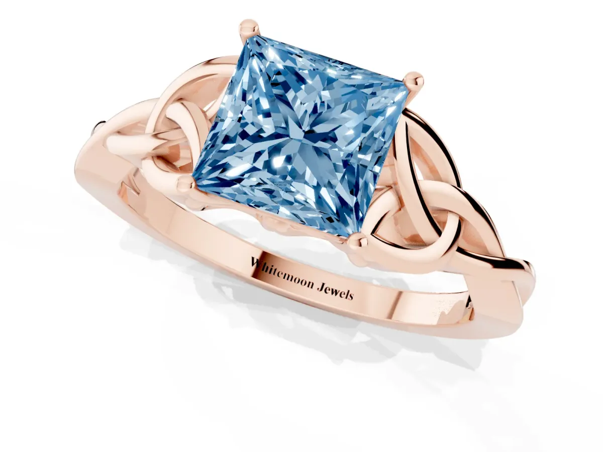 Fancy Blue Princess Cut Diamond Solitaire Engagement Ring with Celtic Knot Band and Four-Prong Setting Rose gold