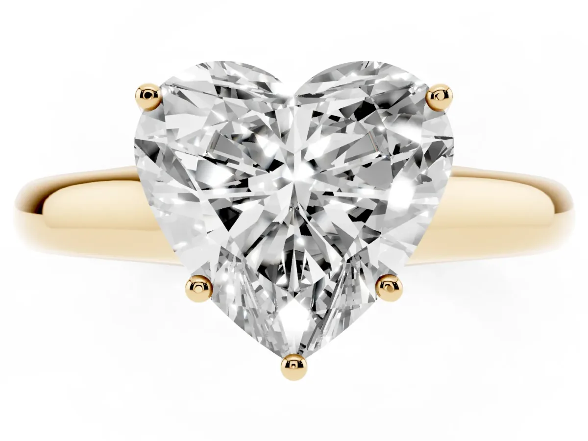 Heart Cut Cut Diamond Solitaire Engagement Ring with Tapered Plain Band and Four-Prong Setting Yellow gold