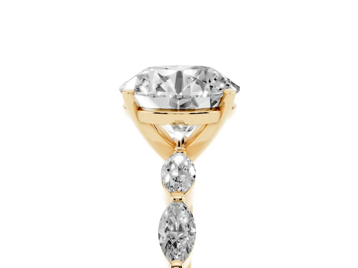 Round Cut Diamond Ring with Marquise Side Stones and Prong Setting Yellow gold