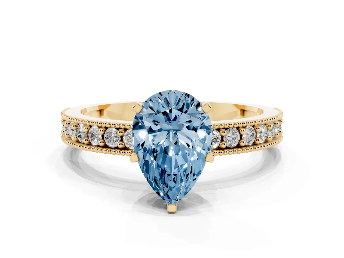 Fancy Blue Pear Cut Diamond Milgrain Pavé Engagement Ring with Four-Prong Setting Yellow gold
