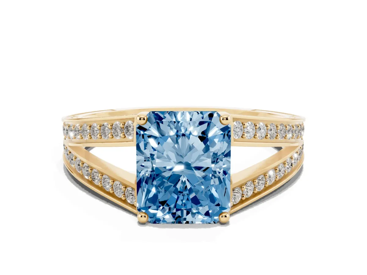Fancy Blue Radiant Cut Diamond Split Shank Ring with Pavé Band and Four-Prong Setting Yellow gold