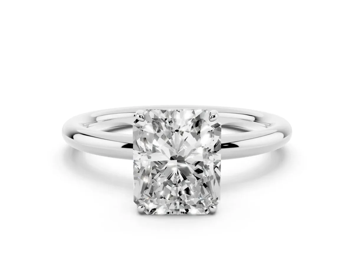 Radiant Cut Solitaire Diamond Ring with Four-Prong Setting on a Plain Band Platinum