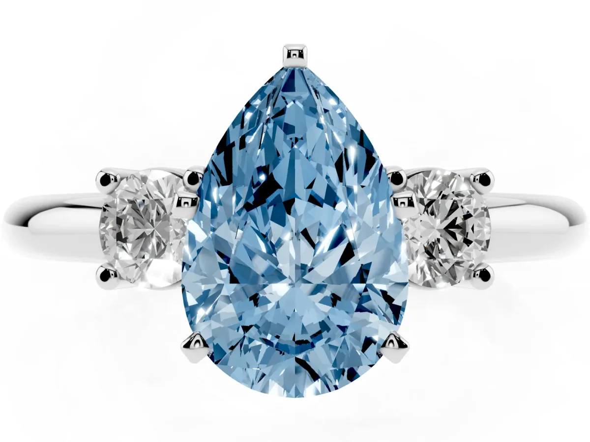 Fancy Blue Three-Stone Pear Cut Cut Diamond Solitaire with Prong Setting and Classic Band Silver