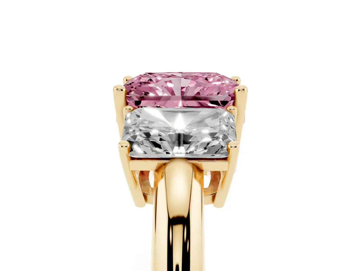 Fancy Pink Three-Stone Radiant Cut Cut Diamond Engagement Ring with Prong Setting on a White Gold Band Yellow gold