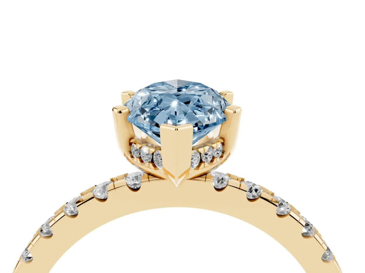 Fancy Blue Marquise Cut Diamond Solitaire Ring with Round Pavé Band and Four-Prong Setting Yellow gold