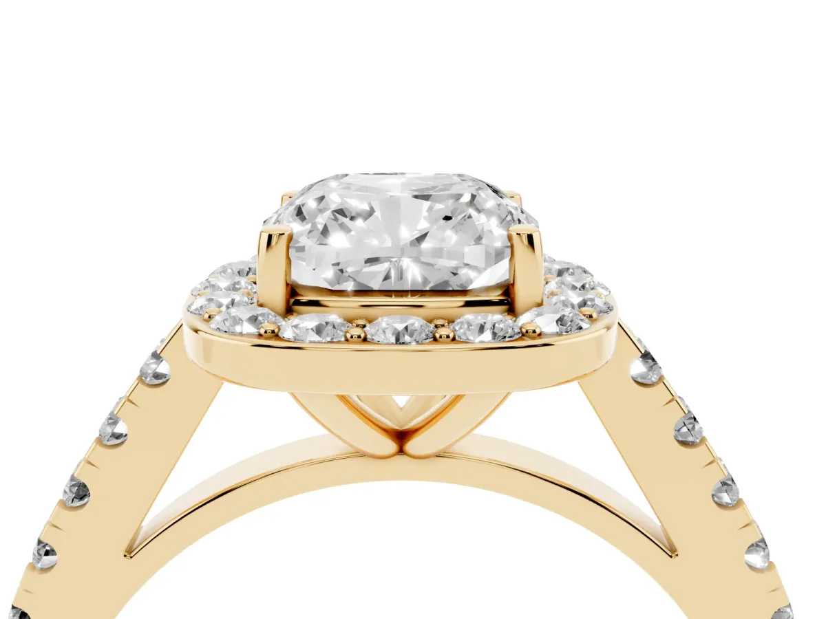 Cushion Cut Diamond Halo Ring with Round Pavé Split Shank and Prong Setting Yellow gold