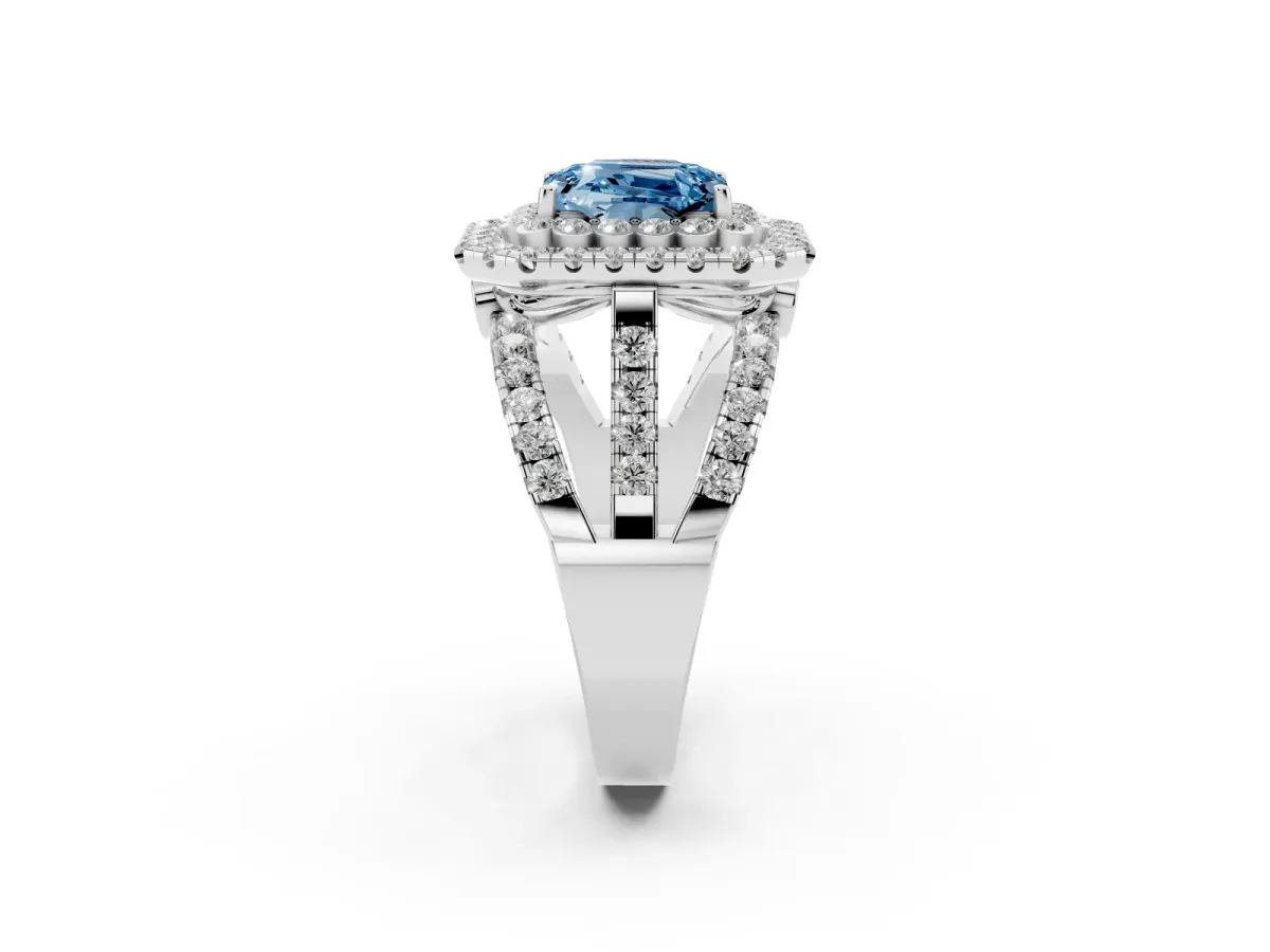 Fancy Blue Emerald Cut Diamond Double Halo Ring with Round Pavé Split Shank and Prong Setting Silver