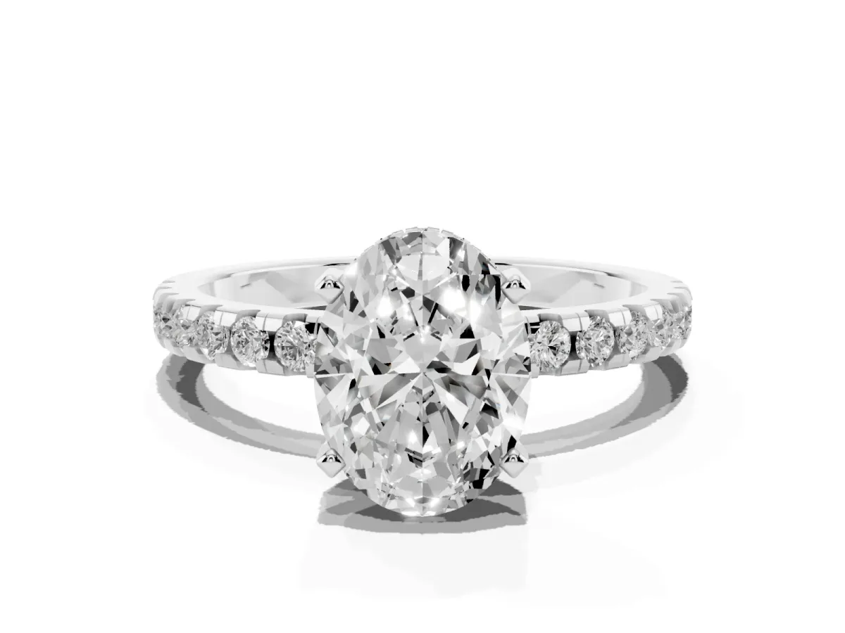 Oval Cut Diamond Solitaire Ring with Round Pavé Band and Four-Prong Setting Silver