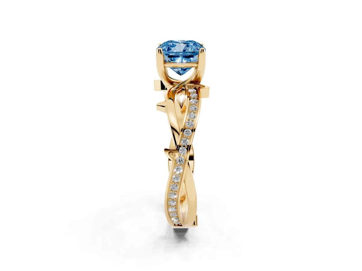 Fancy Blue Cushion Cut Solitaire Twist Band with Pavé Accents and Four-Prong Setting Yellow gold