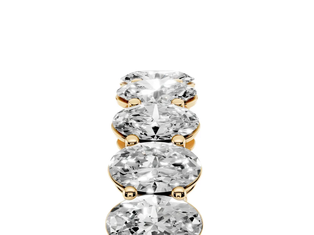 Oval Cut Diamond Eternity Band with Shared Prong Setting Yellow gold