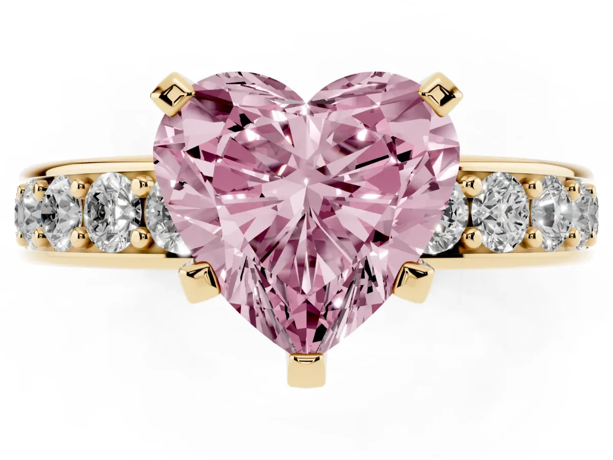 Fancy Pink Heart Cut Diamond Engagement Ring with Channel Set Round Band and Prong Setting Yellow gold