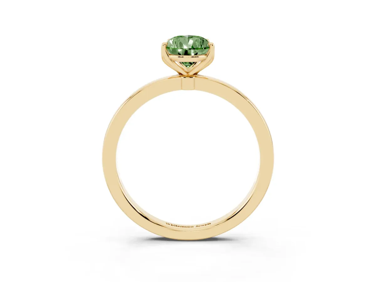 Fancy Green Pear Cut Diamond Solitaire Ring with Thin Band and Prong Setting Yellow gold