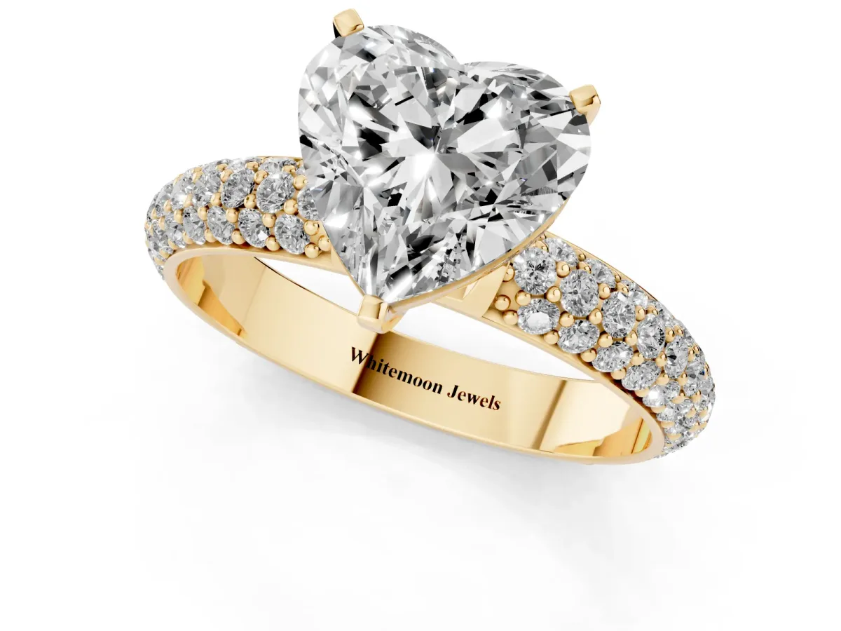 Heart Cut Diamond Solitaire Ring with Prong Setting and Pavé Band Yellow gold