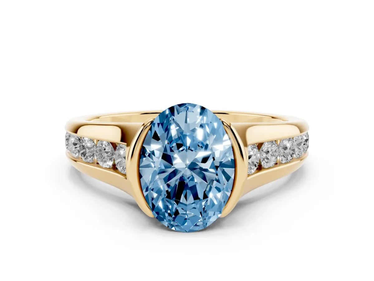 Fancy Blue Oval Cut Solitaire Bezel-Set Diamond Ring with Channel-Set Band Yellow gold