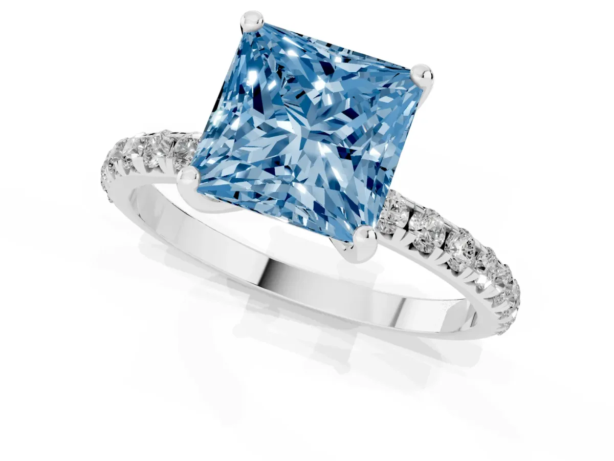 Fancy Blue Princess Cut Cut Diamond Solitaire Ring with Micro Pave Band and Four Prong Setting Silver