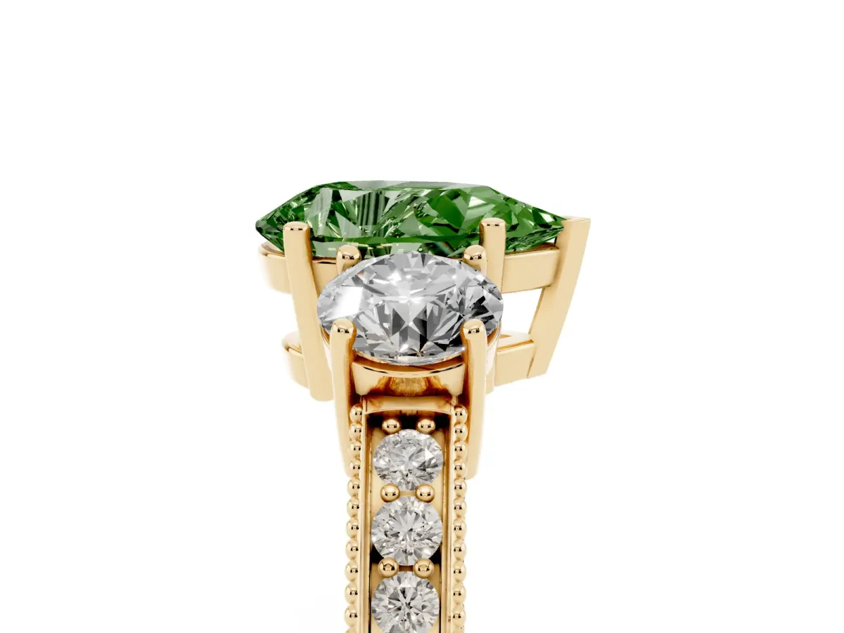 Fancy Green Pear Cut Three-Stone Diamond Ring with Pavé Band and Four-Prong Setting Yellow gold