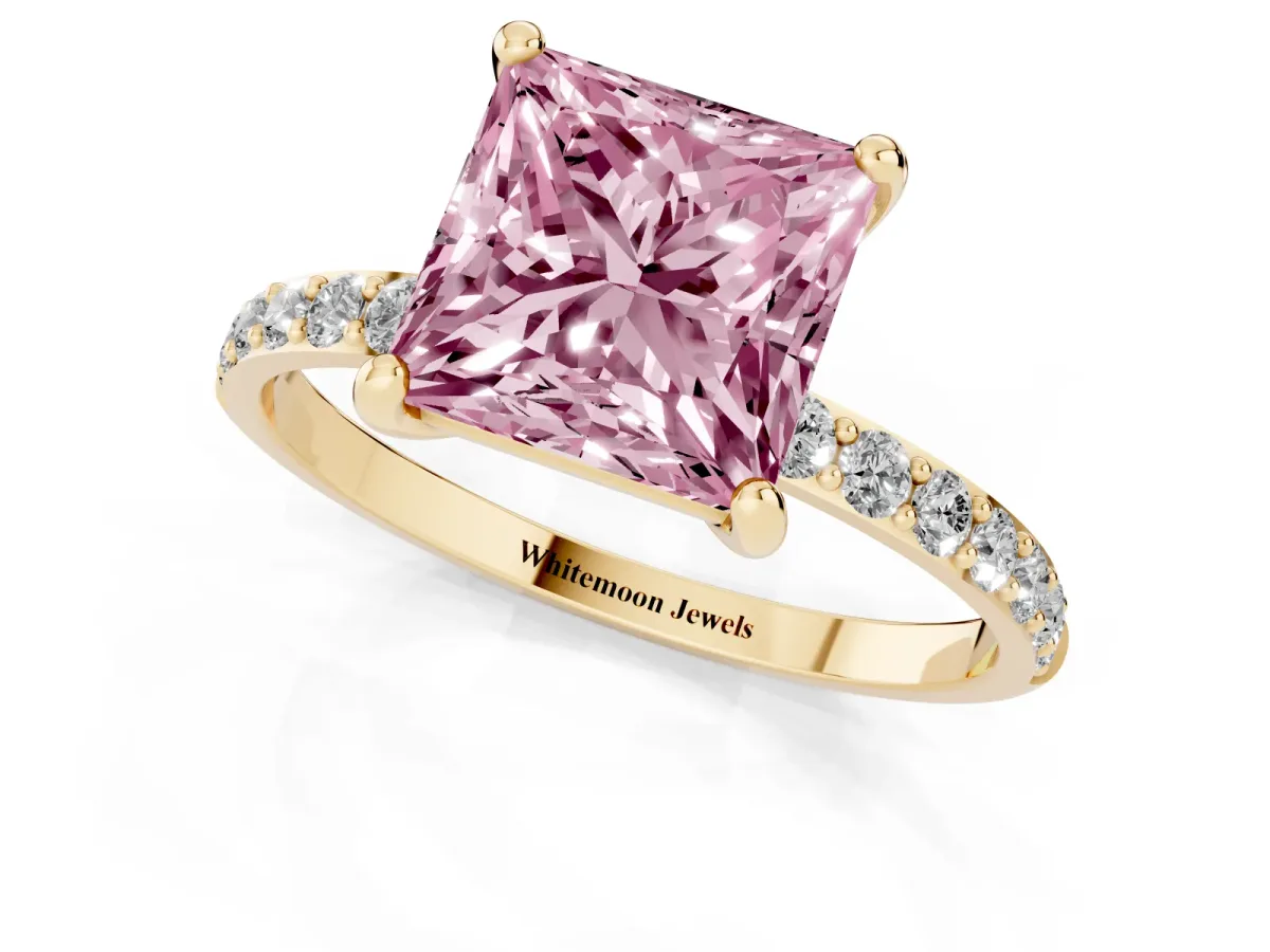 Fancy Pink Princess Cut Diamond Solitaire Ring with Round Pavé Band and Prong Setting Yellow gold