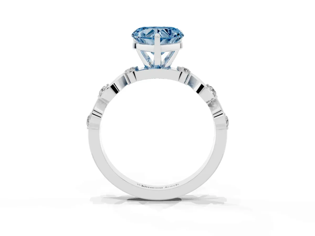 Fancy Blue Heart Cut Diamond Solitaire Twisted Band with Round Accents and Prong Setting Platinum