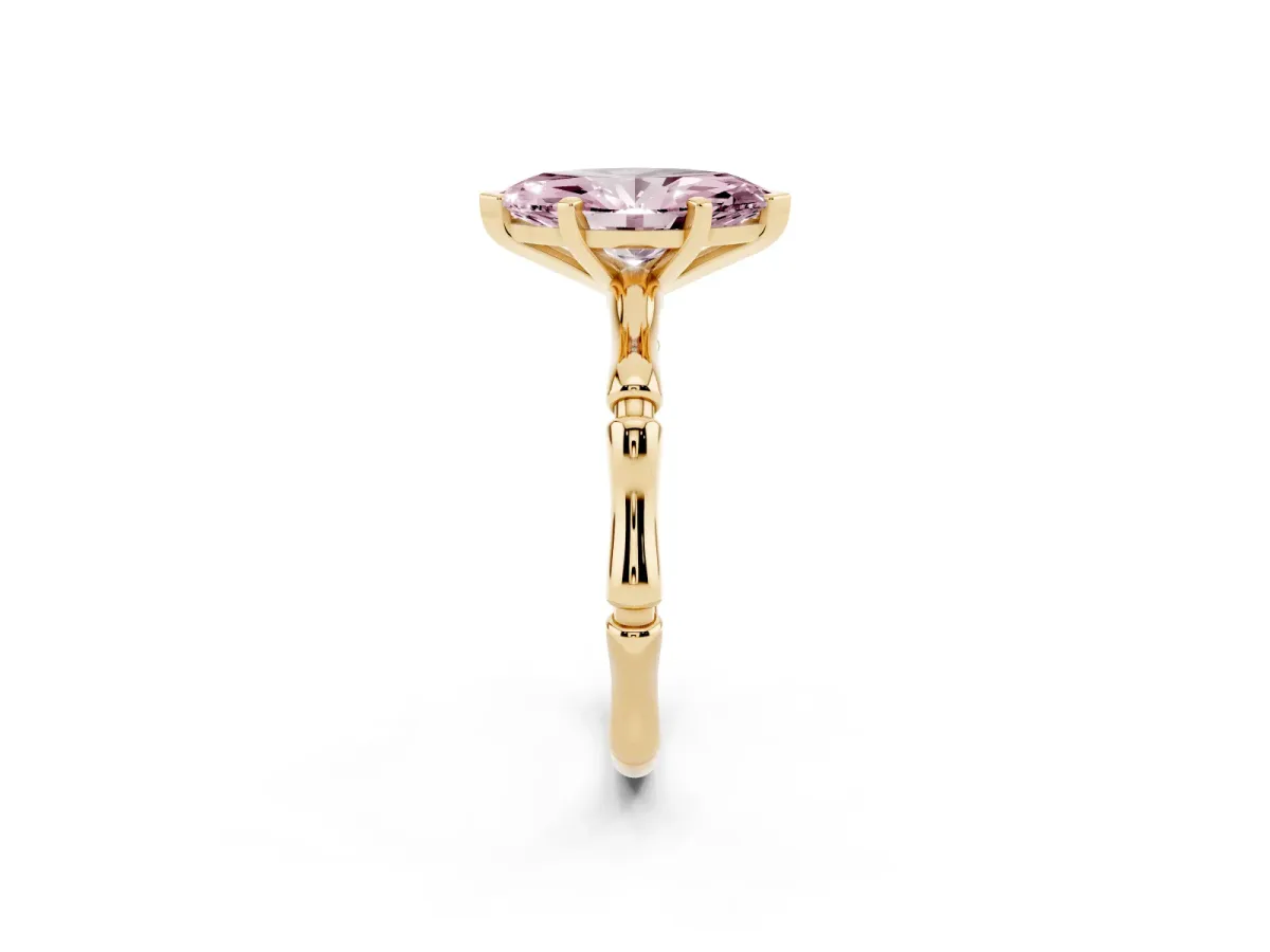 Fancy Pink Marquise Cut Solitaire Diamond Ring with Bamboo Band and Four-Prong Setting Yellow gold