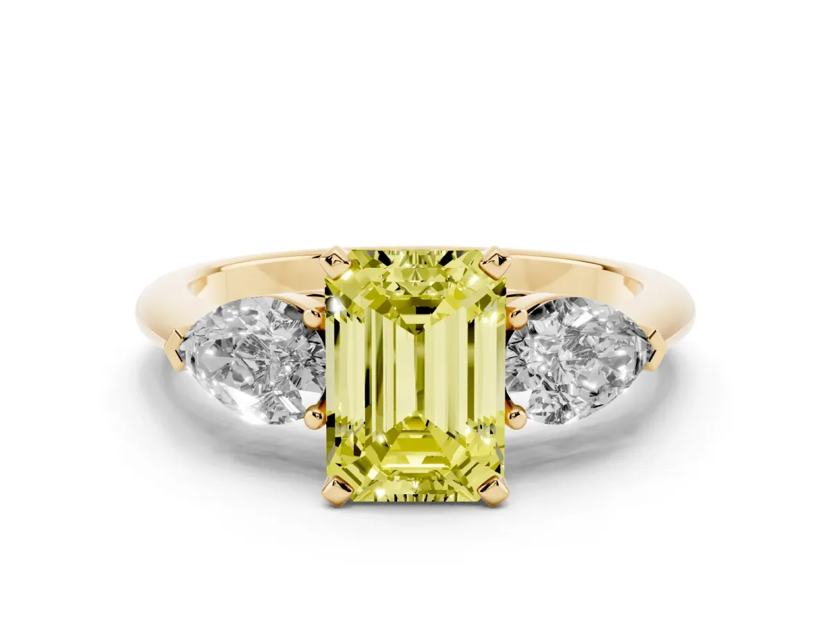 Fancy Yellow Three-Stone Emerald Cut Diamond Ring with Pear Side Stones and Four-Prong Setting Yellow gold