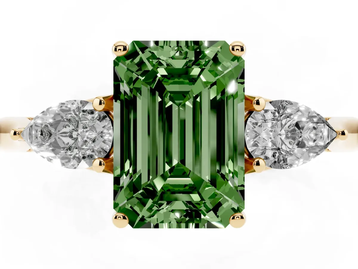 Fancy Green Emerald Cut Diamond Three-Stone Ring with Pear Side Stones and Prong Setting Yellow gold
