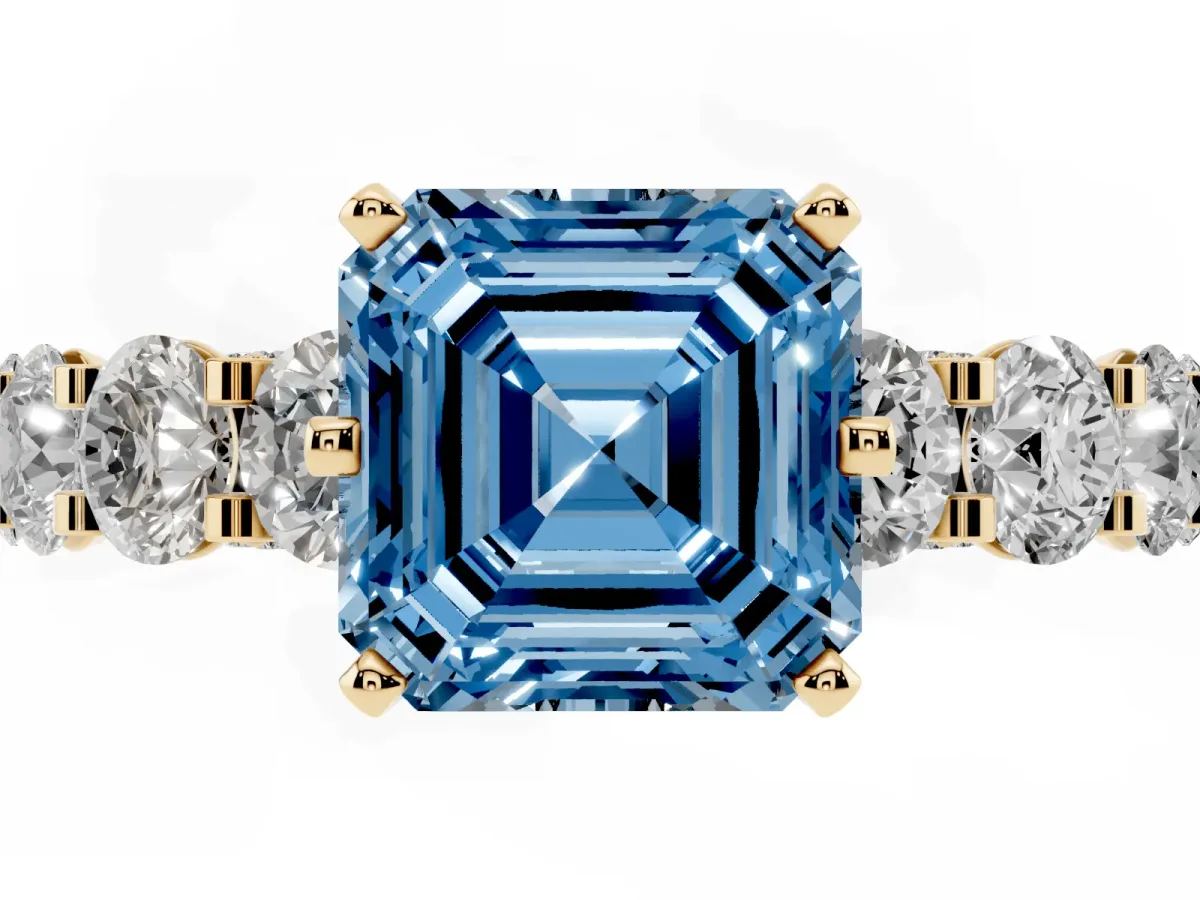 Fancy Blue Asscher Cut Diamond Side Stone Engagement Ring with Four-Prong Setting Yellow gold