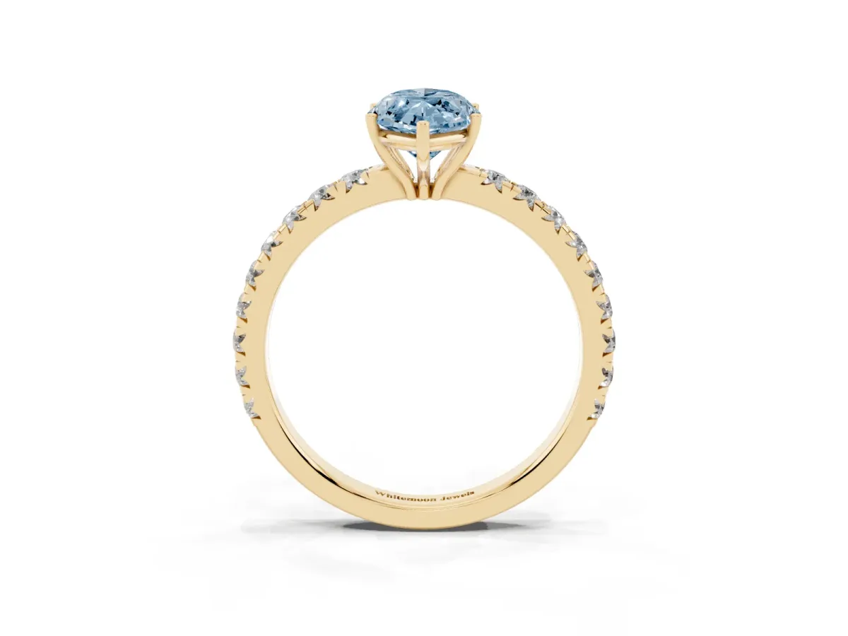 Fancy Blue Marquise Cut Diamond Pavé Solitaire Engagement Ring with Four-Prong Setting Yellow gold
