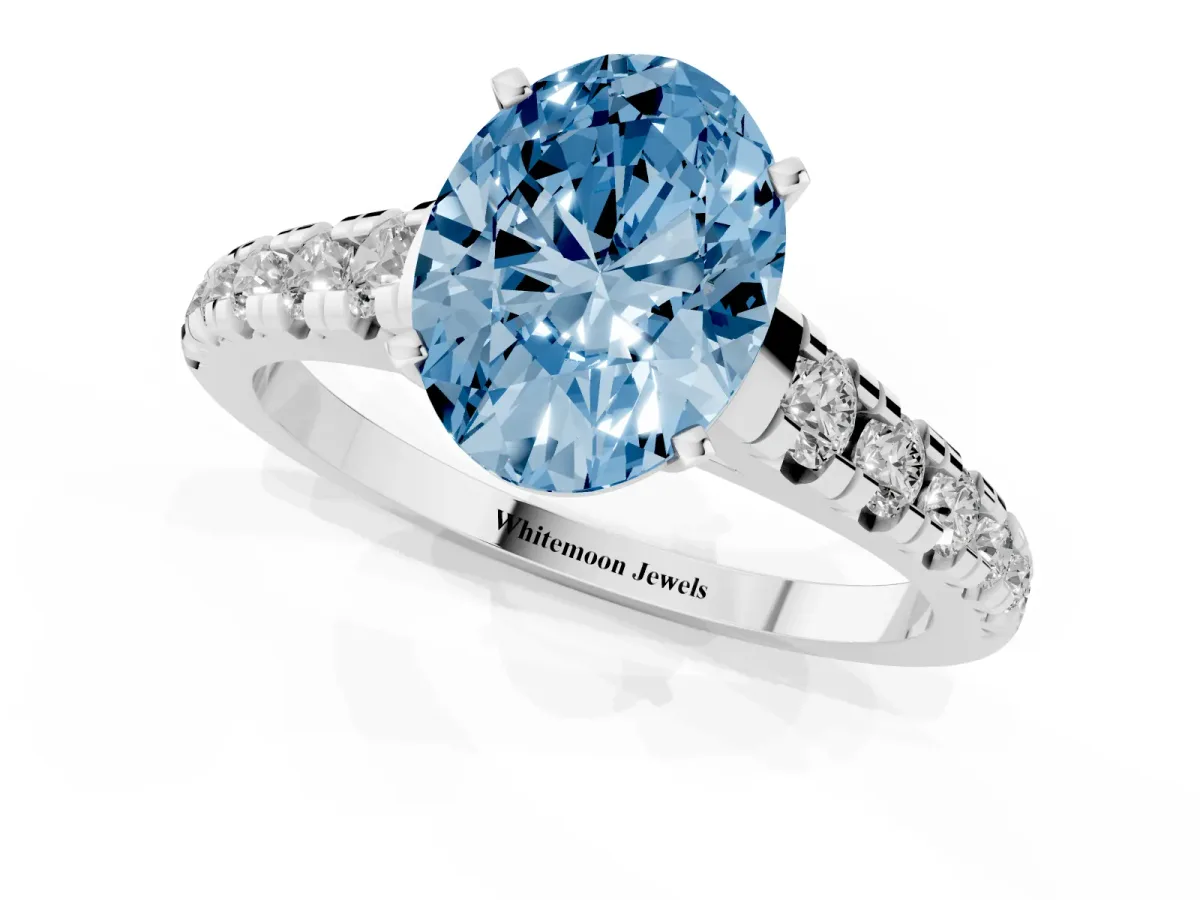 Fancy Blue Oval Cut Diamond Cathedral Solitaire Ring with Round Pavé Band Silver