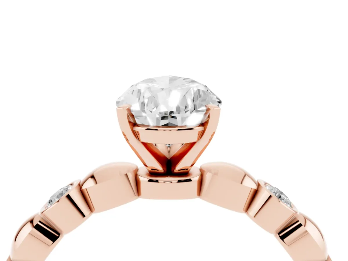 Pear Cut Solitaire Bezel-Set Diamond Ring with Beaded Band and Four-Prong Setting Rose gold