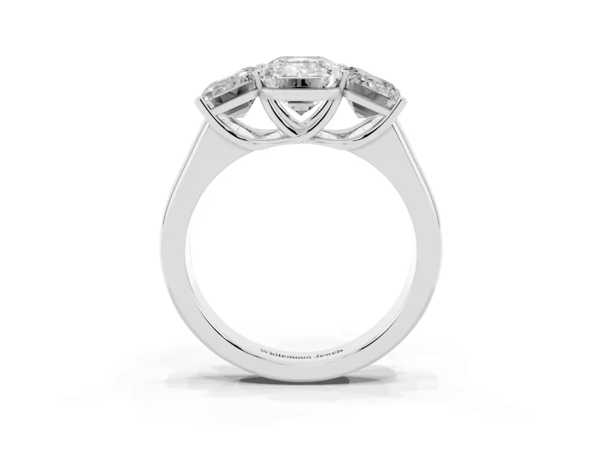 Emerald Cut Three-Stone Diamond Ring with Prong Setting on a Classic Band White gold