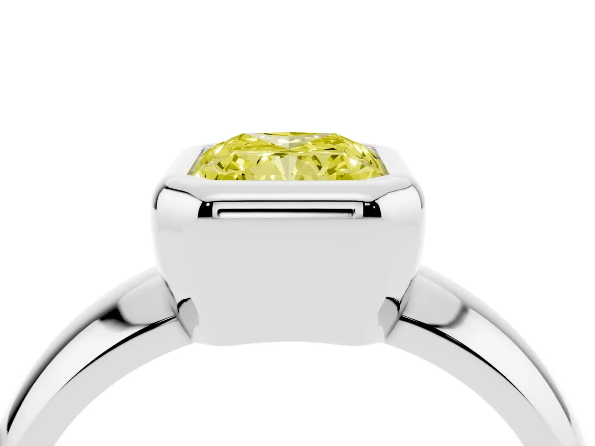 Fancy Yellow Bezel Set Radiant Cut Solitaire Ring with Wide Band Silver