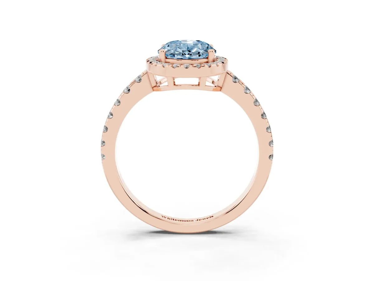 Fancy Blue Oval Cut Diamond Halo Ring with Pavé Band and Four-Prong Setting Rose gold