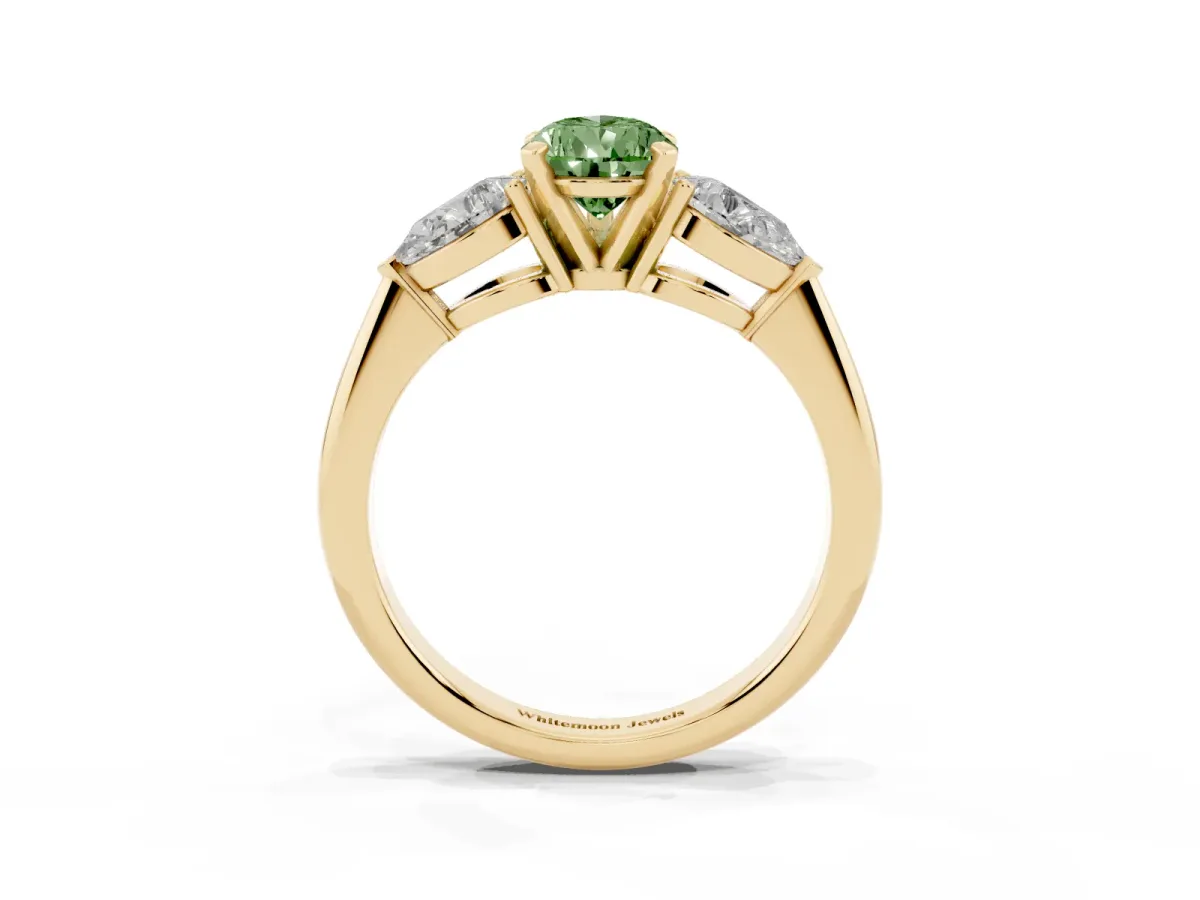Fancy Green Three-Stone Pear Cut Diamond Ring with Pear Side Stones and Four-Prong Setting Yellow gold