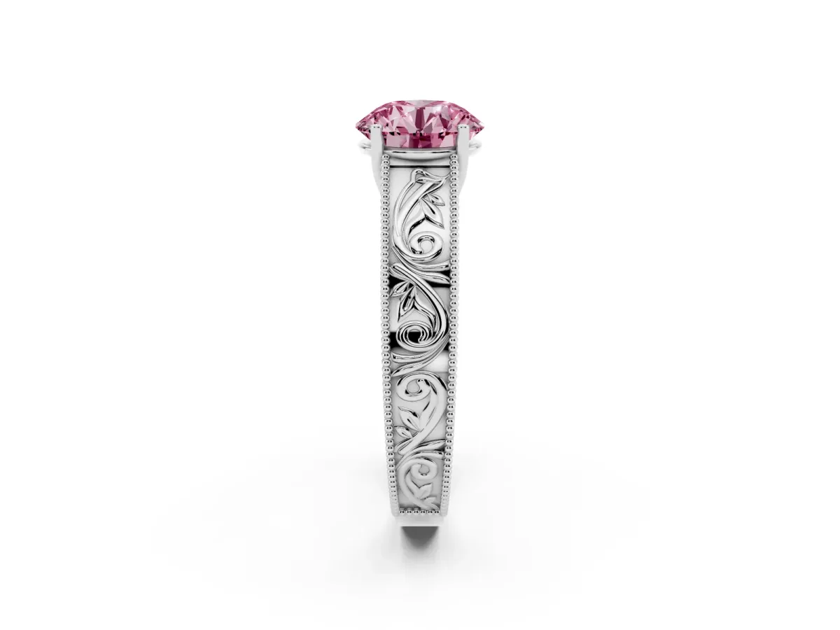 Fancy Pink Round Cut Diamond Solitaire Ring with Engraved Band and Four-Prong Setting White gold