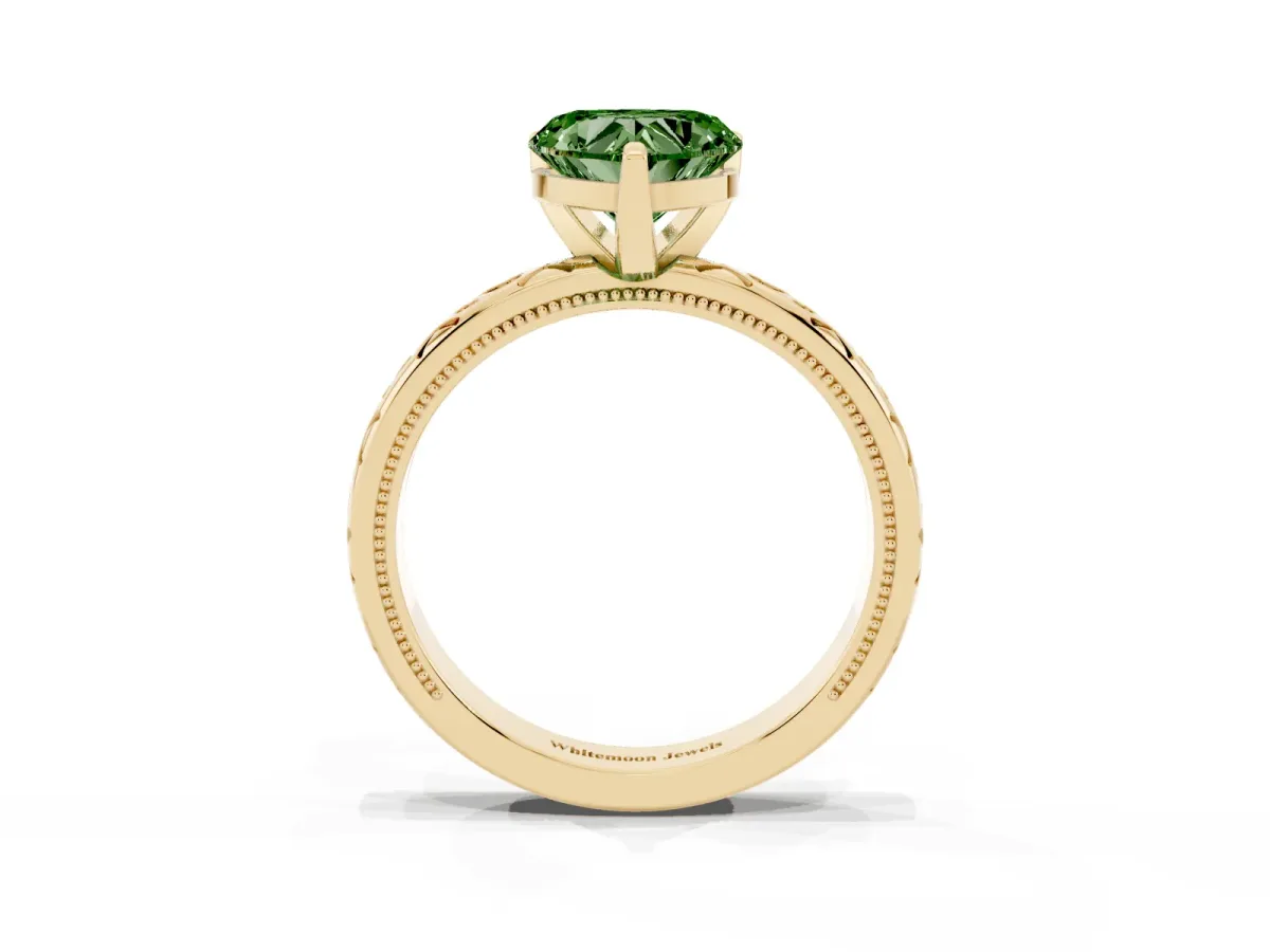 Fancy Green Heart Cut Solitaire Engagement Ring with Scrollwork Band and Four-Prong Setting Yellow gold