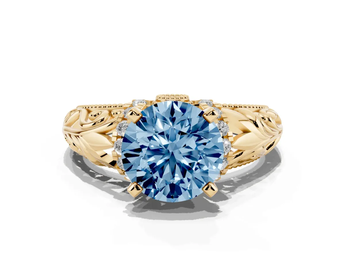 Fancy Blue Round Cut Solitaire Filigree Engagement Ring with Halo and Prong Setting Yellow gold