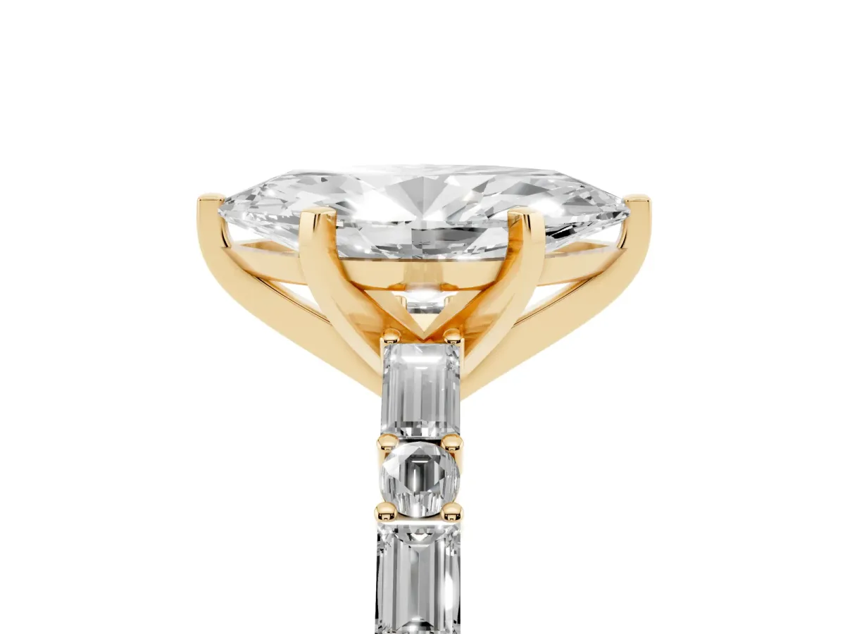 Marquise Cut Diamond Solitaire with Side Baguettes and Channel Set Band Yellow gold
