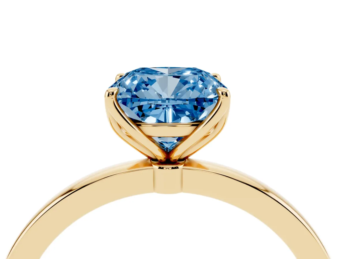 Fancy Blue Cushion Cut Diamond Solitaire Ring with Thin Band and Prong Setting Yellow gold