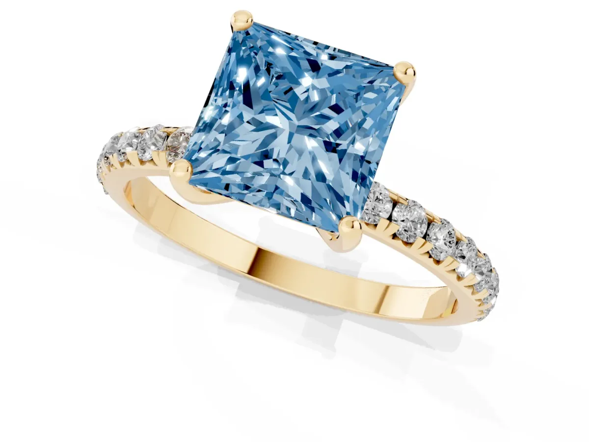 Fancy Blue Princess Cut Cut Diamond Solitaire Ring with Micro Pave Band and Four Prong Setting Yellow gold