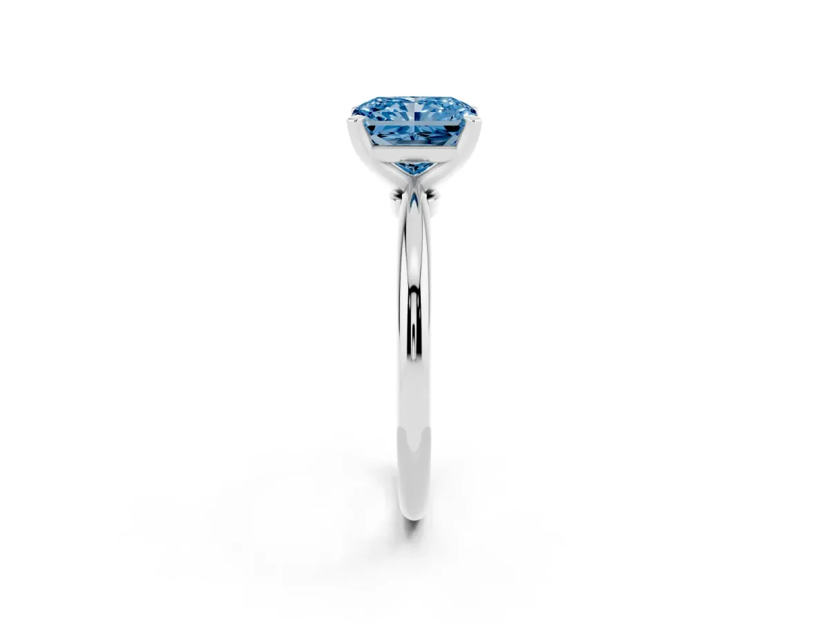 Fancy Blue Radiant Cut Diamond Solitaire Ring with Prong Setting and Classic Band Platinum